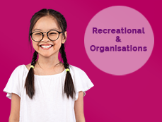 recreational and organisations next to Asian girl with pig tails and glasses smiling broadly