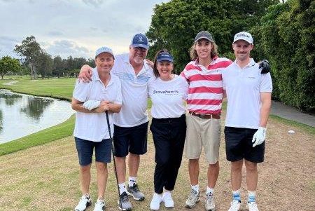 Photo of 4 golfers with Bravehearts CEO