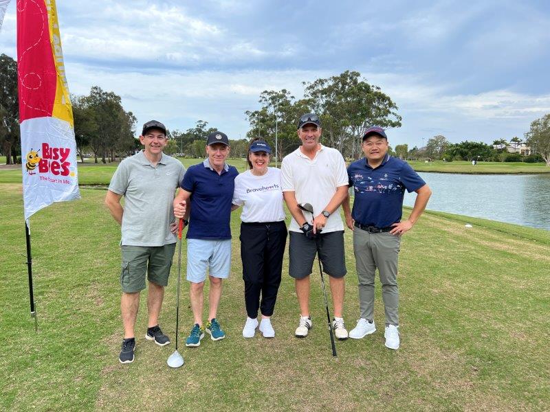 Photo of golfers with Bravehearts CEO at Busy Bees hole