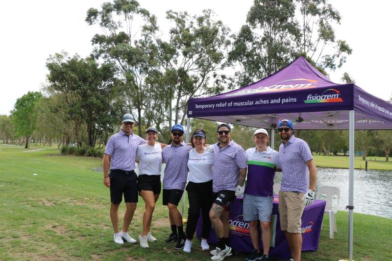 4 golfers, 2 Bravehearts Employees and Fisiocrem employee at Fisiocrem tent